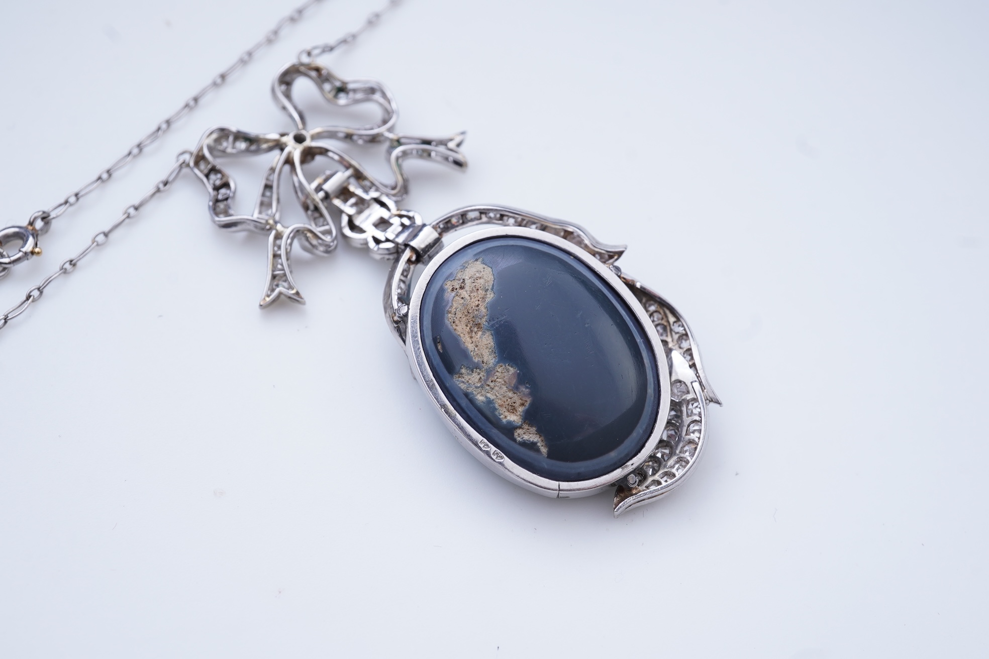 An impressive Belle Epoque black opal and diamond pendant, early 20th century
